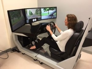 Julie Muccini, neuroclinical specialist, in the Stanford driving simulator