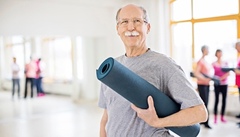 Man in yoga class