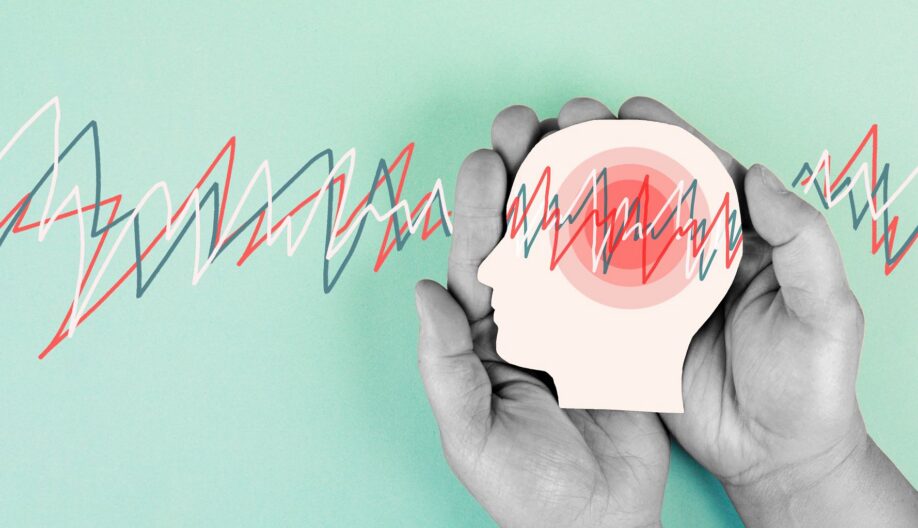Paper cut out of head in hands with static lines throughout
