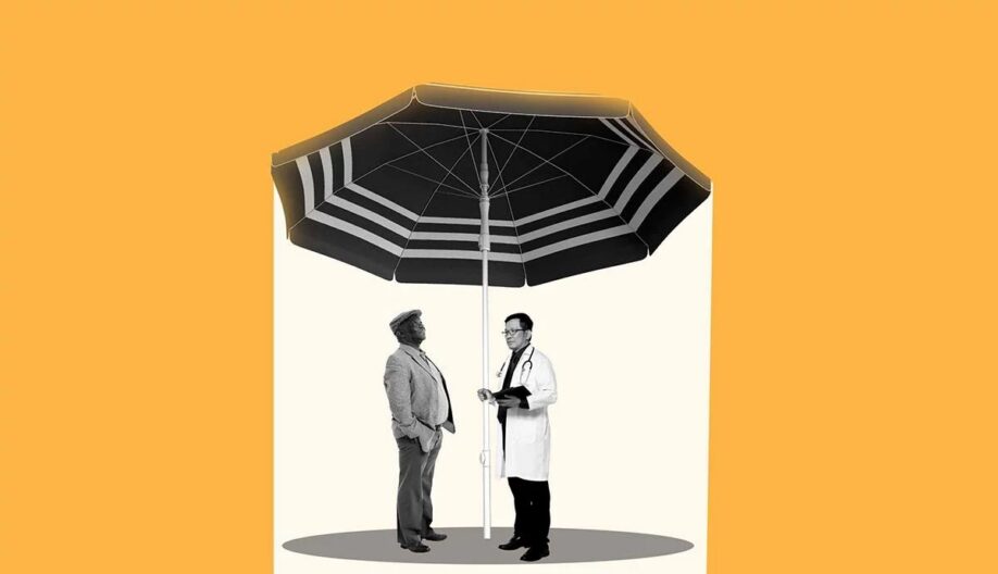 Doctor and patient talk under umbrella