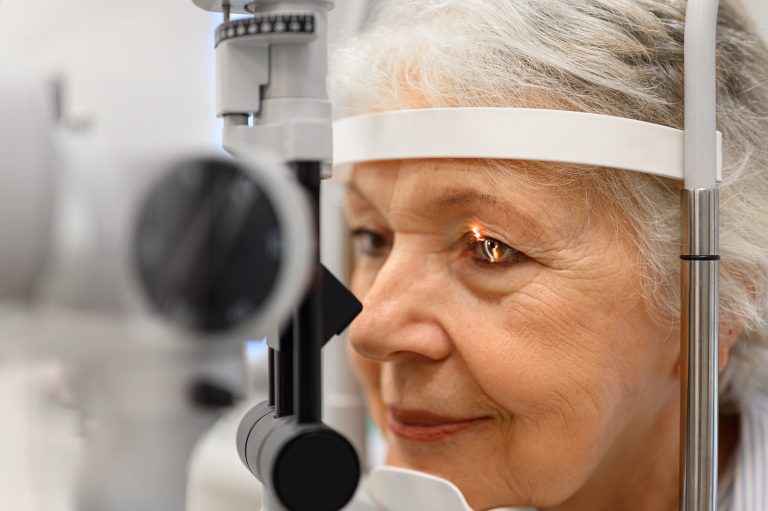 Woman getting eye exam