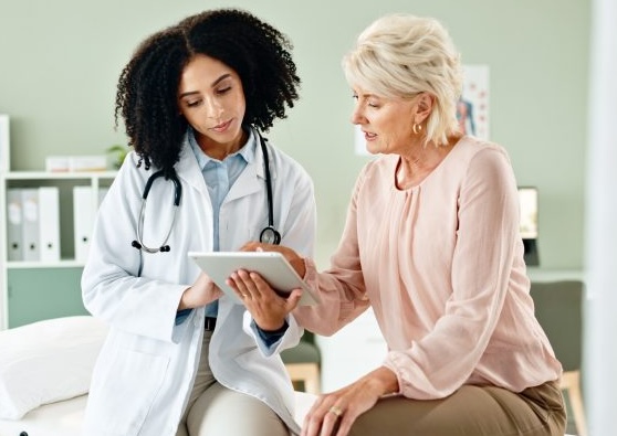 doctor takling to patient about questions