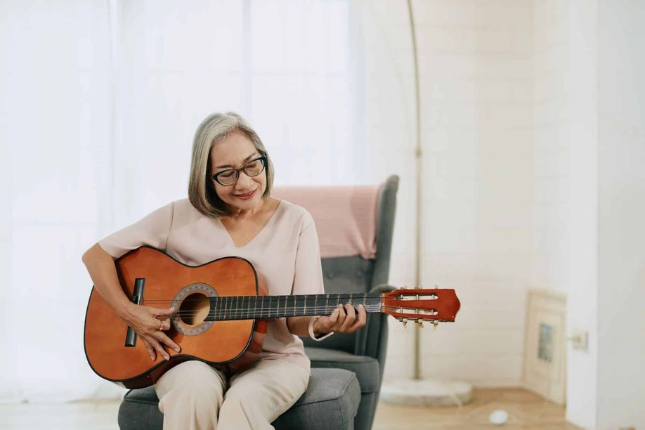 Woman playing guitar